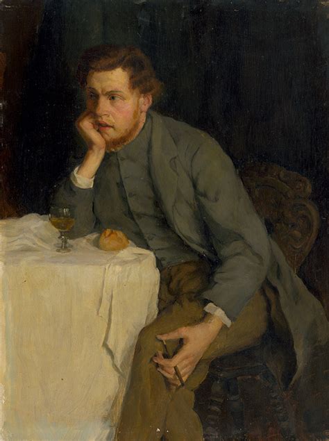 Muž pri pohári vína