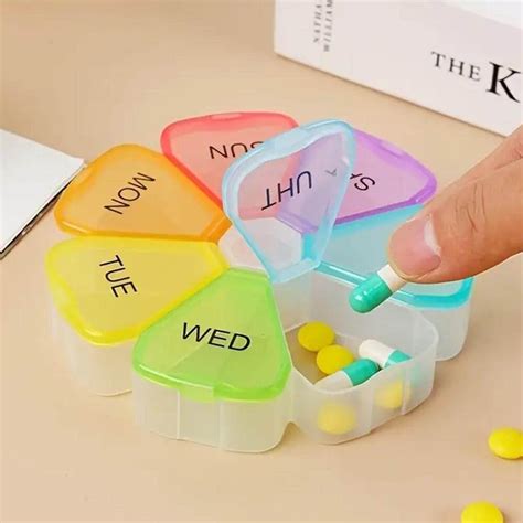 Obrázok liekov a pohára