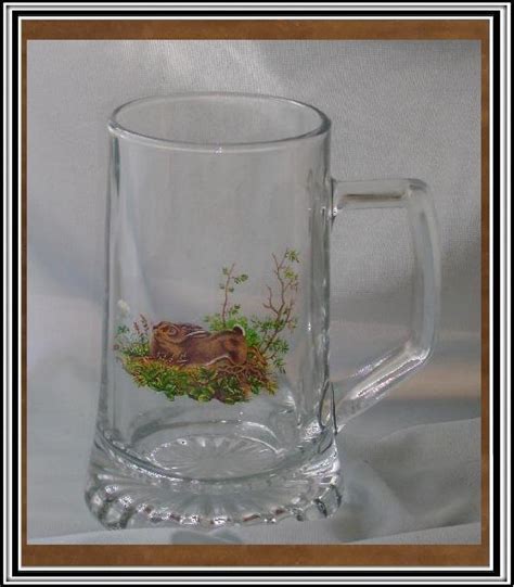 masívny sklenený krígeľ s poľovníckym motívom