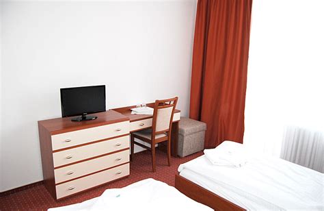 Interiér dvojlôžkovej izby v Pivovare BUC Kvačany