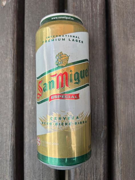 Tanier s Leconom a fľaša piva San Miguel