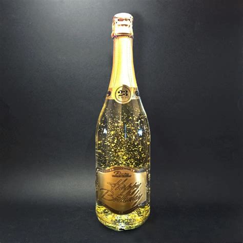 Fľaša vína so zlatými vločkami